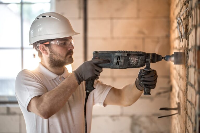 handyman-uses-jackhammer-installation