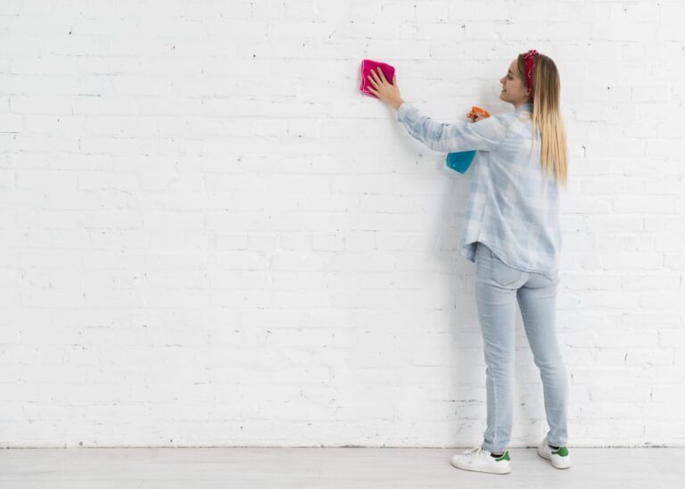 side-view-woman-cleaning-wall